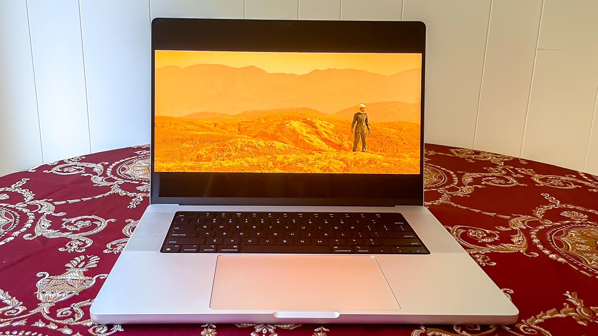 MacBook Pro 2021 (16-inch) on a table showing a short movie