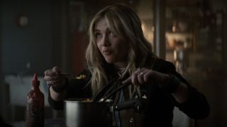 Yelena Belova (Florence Pugh) eats on Hawkeye