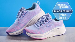 Skechers Max Cushioning Elite 2.0 running shoes photographed in front of a blue background.