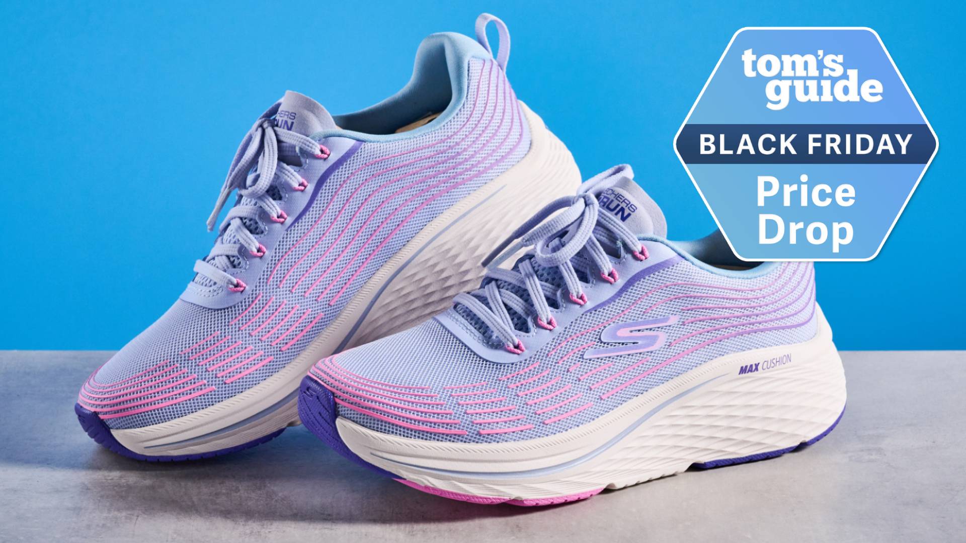 Skechers Max Cushioning Elite 2.0 running shoes photographed in front of a blue background. 