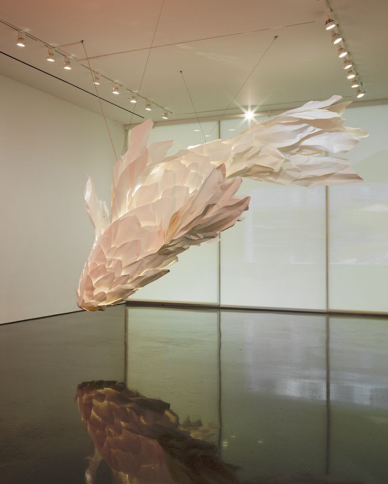 Louis Vuitton x Frank Gehry Limited-Edition Handbag Collection's coinciding exhibition boasts gigantic fish-shaped sculptures and similarly inspired bags in a stunning presentation.