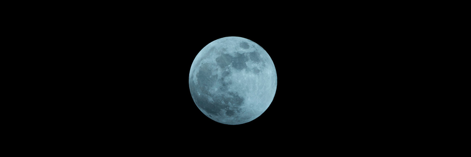 blue moon in the night sky