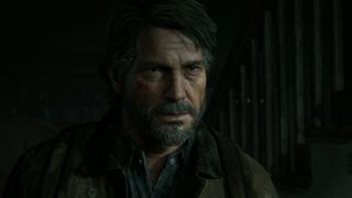 Joel, a grizzled middle-aged survivor from the Last of Us, stares intensely at something off-screen.