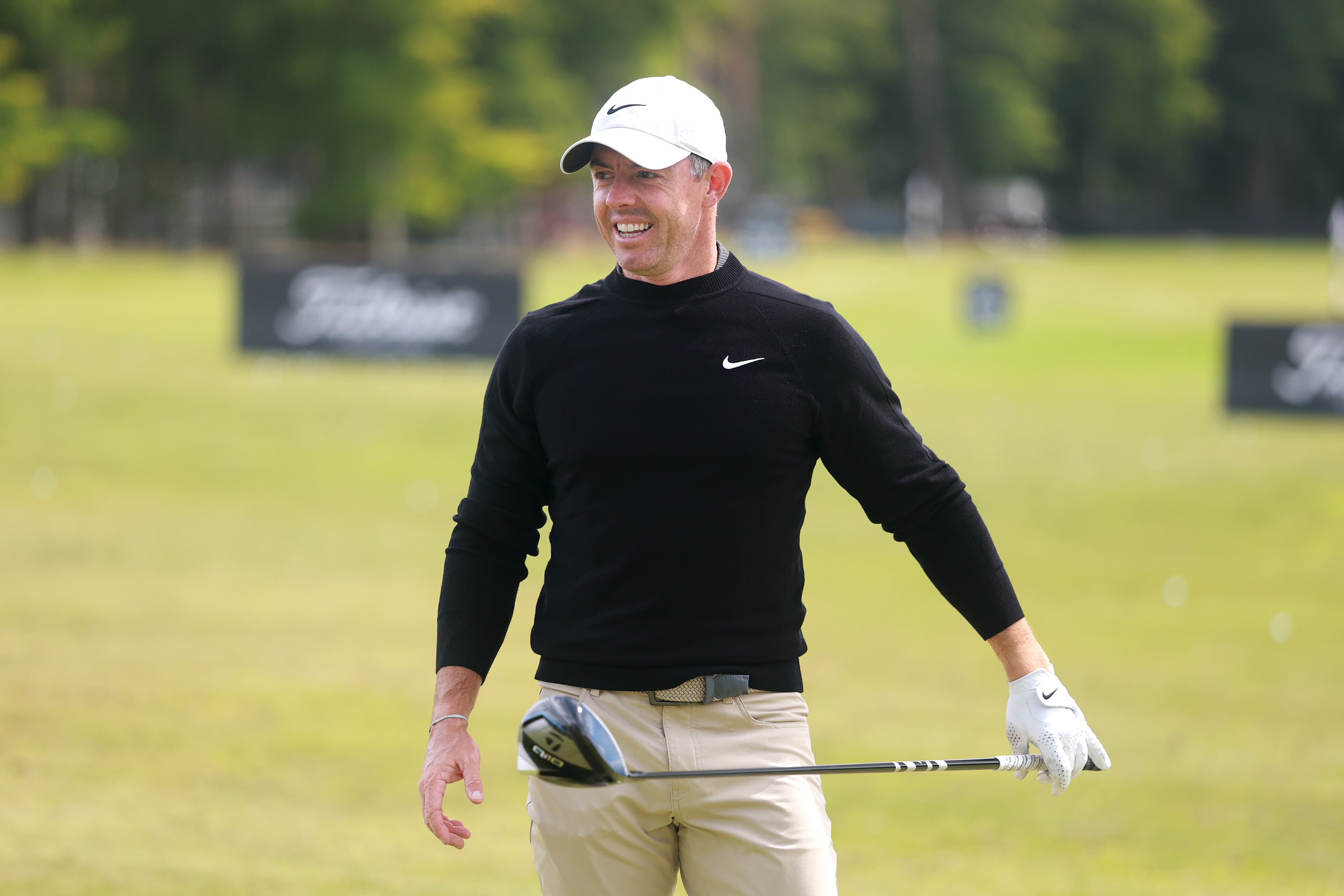 Rory McIlroy hits a golf ball on the range