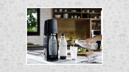 Sodastream Terra sparkling water maker appliance lifestyle image on bubble background