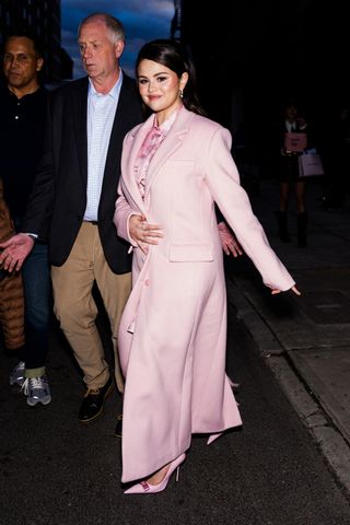 Selena Gomez wears head to toe pink in New York City for a Rare Beauty event