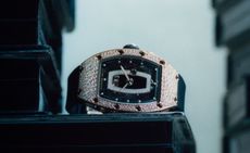black Richard Mille RM 037 watch with diamonds round the dial