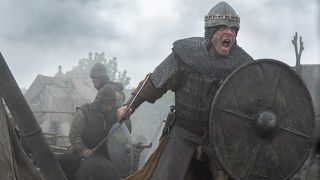 A ferocious-looking Harold II (James Norton) brandishes sword and shield as he emerges from a fog-strewn encampment in new BBC drama King and Conqueror.