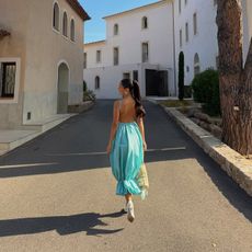 Alexandra Leclerc wearing the aqua blue color trend.