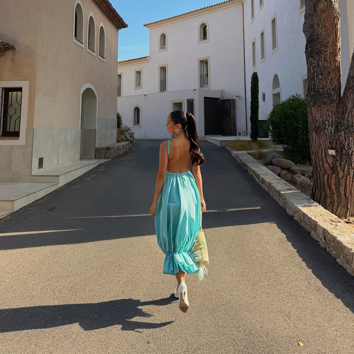 Alexandra Leclerc wearing the aqua blue color trend.