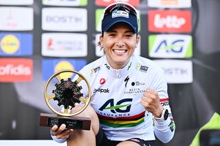 LIEGE BELGIUM APRIL 27 Kim Le Court of Mauritius and AG InsuranceSoudal Team celebrates at podium as race winner during the 9th Liege Bastogne Liege Femmes 2025 a 1529km one day race from Bastogne to Liege UCIWWT on April 27 2025 in Liege Belgium Photo by Luc ClaessenGetty Images
