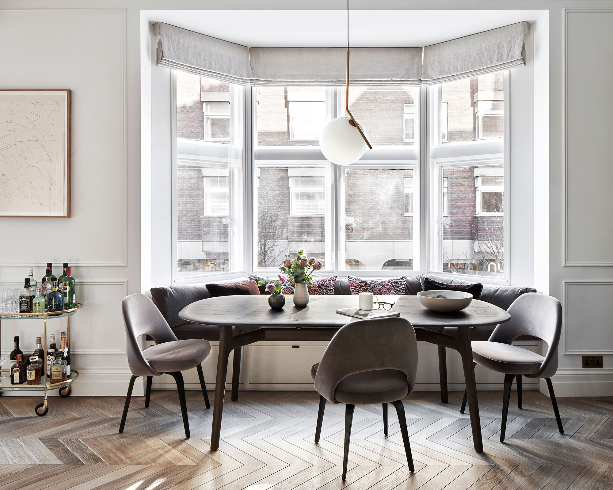 Dining room ideas with window seat and armless chairs