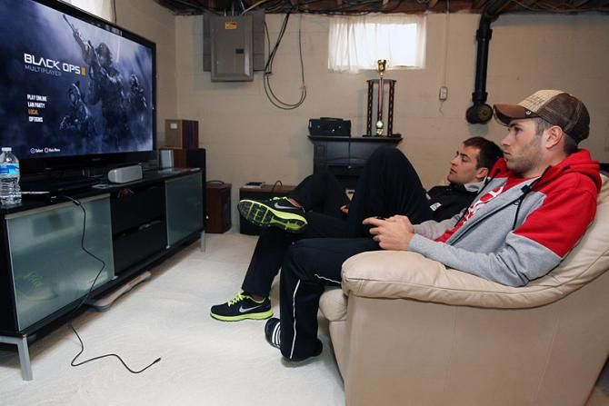 The life of a pro cyclist - Niels Albert and Wietse Bosmans pass the time playing Call of Duty: Black Ops II.