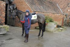8-Nic-and-Annie-Clover-outside-entrance-to-the-converted-barn-where-19-horses-are-now-stabled.jpg