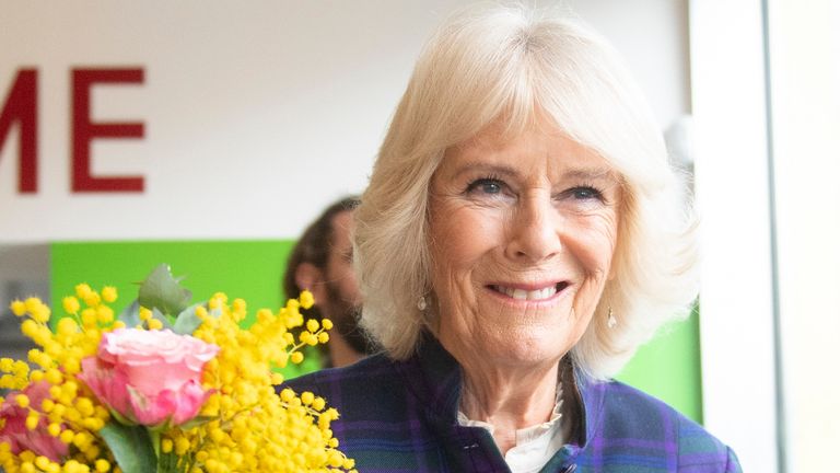 Camilla, Duchess of Cornwall is presented with flowers at the end of her visit to Nourish Hub, Shepherd's Bush on February 10, 2022 in London, England. The Nourish Hub is a purpose-built democratic space, run by charity UKHarvest, and forms part of Hammersmith and Fulham Council's fight to end food poverty and tackle the climate emergency.