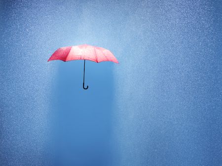 pink umbrella in a rain shower