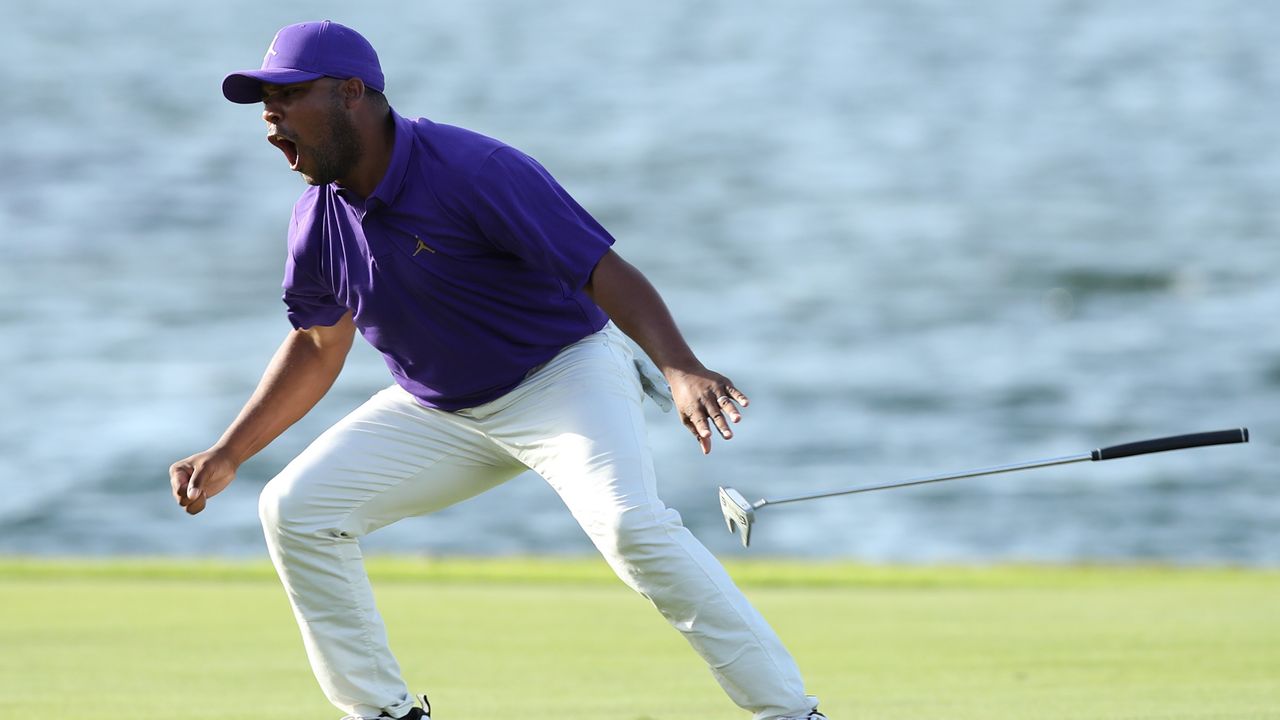 Harold Varner III celebrates after winning the 2022 Saudi International