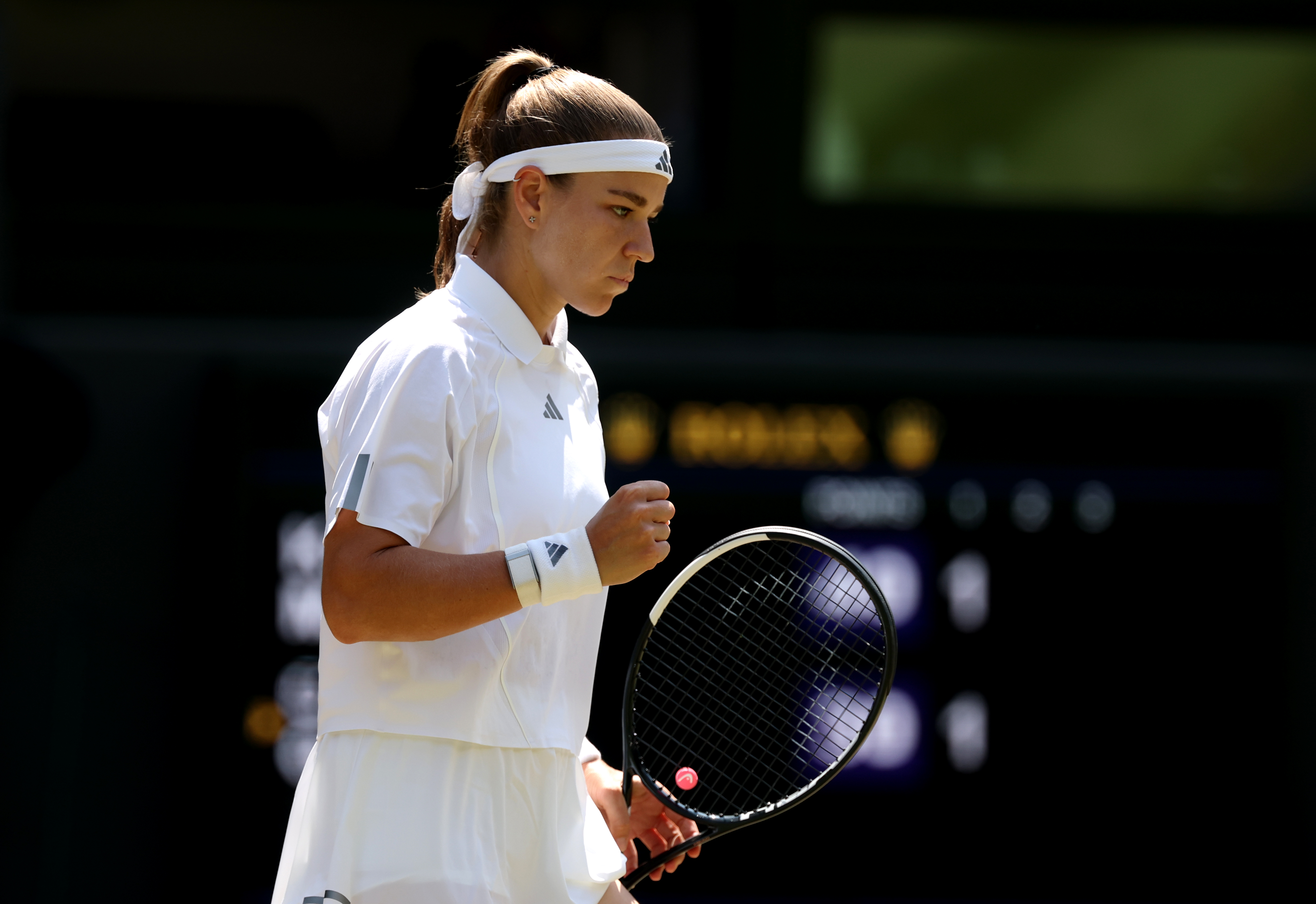 Karolina Muchova with racquet in hand