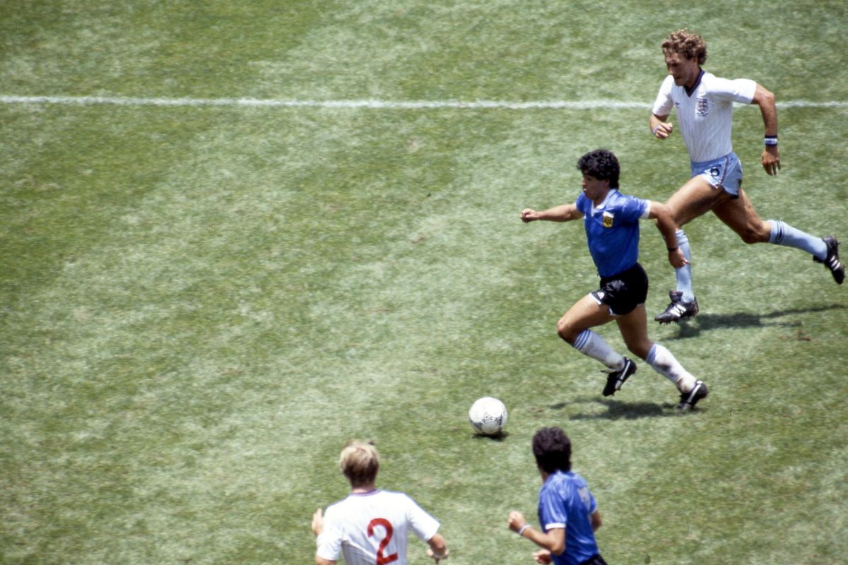 Diego Maradona dribbles en route to scoring his 'Goal of the Century' for Argentina against England in the quarter-final of the 1986 World Cup in Mexico