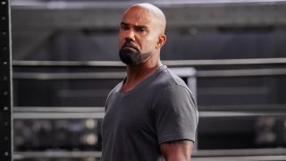 Shemar Moore standing and looking serious on S.W.A.T.