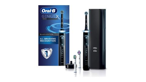 Image shows a black Oral B Genius X along with accessories and its box.