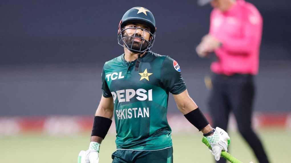 Pakistan&#039;s Mohammad Rizwan walks back to the pavilion after his dismissal by South Africa&#039;s Kwena Maphaka (unseen) during the first T20 international cricket match between South Africa and Pakistan at the Kingsmead stadium in Durban