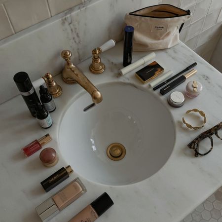 Jessica Skye's bathroom sink including lots of beauty products in the black friday sales 2025