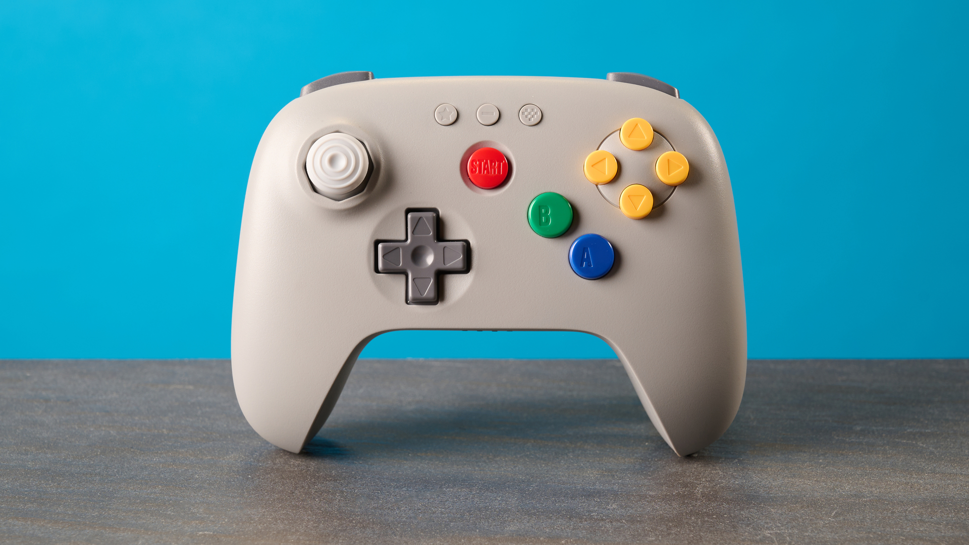 The 8BitDo 64 Controller against a blue background