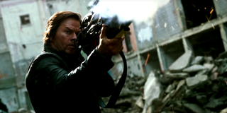 Mark Wahlberg as Cade Yeager shooting projectile