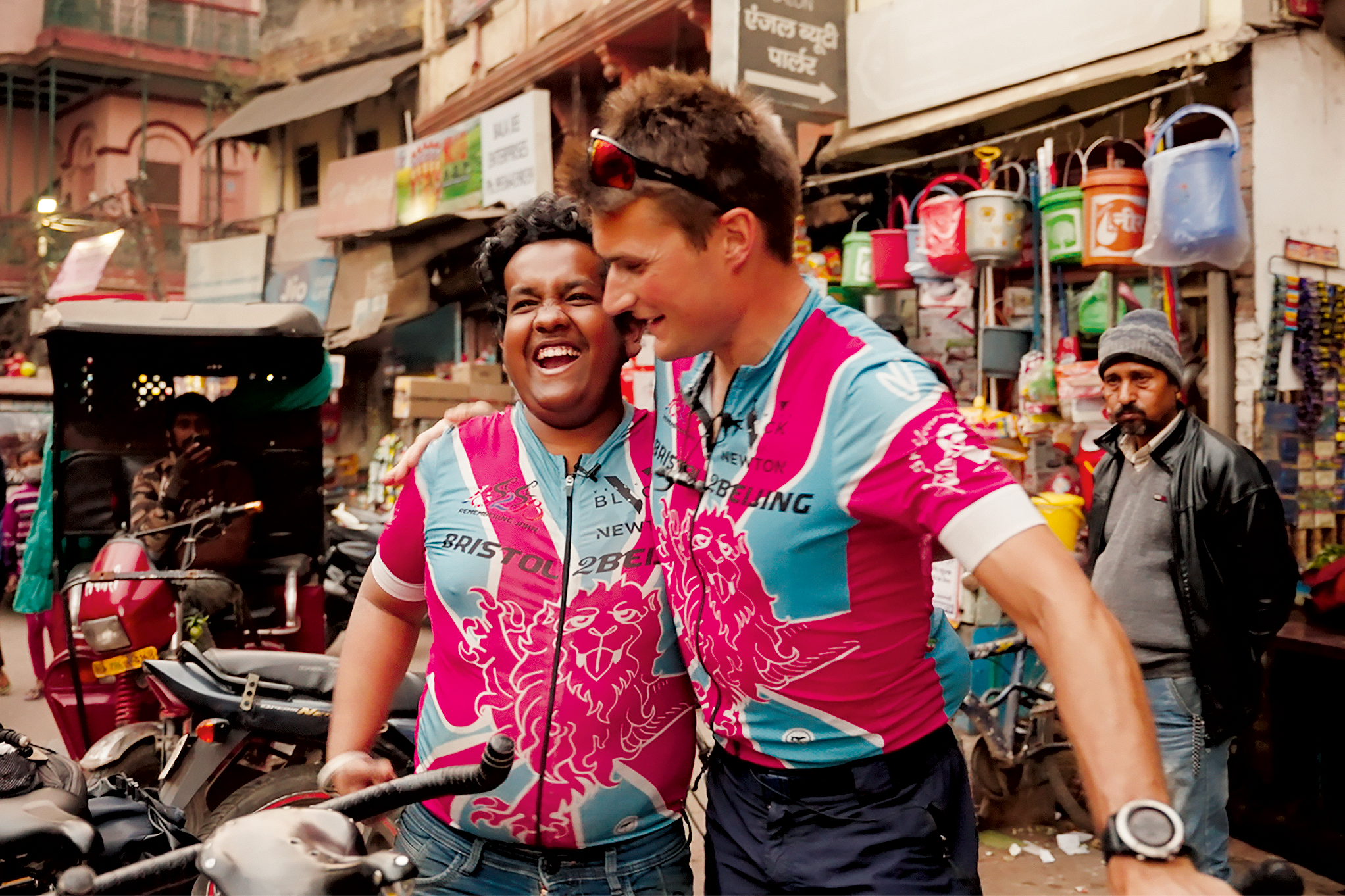Luke Grenfell-Shaw in a pink jersey with his friend Dev
