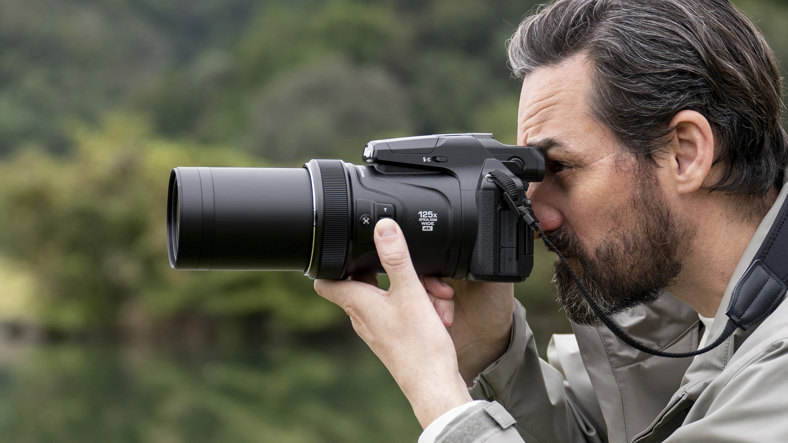 Nikon Coolpix P1100 superzoom camera in the hand