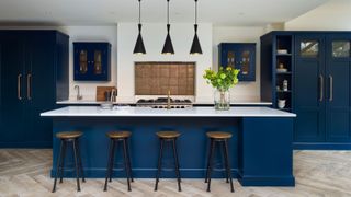 blue shaker kitchen with large kitchen island