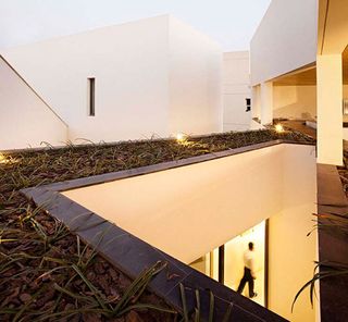 The very top features a shaded and carefully landscaped covered terrace...