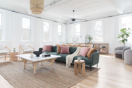 A living dining room in muted tones