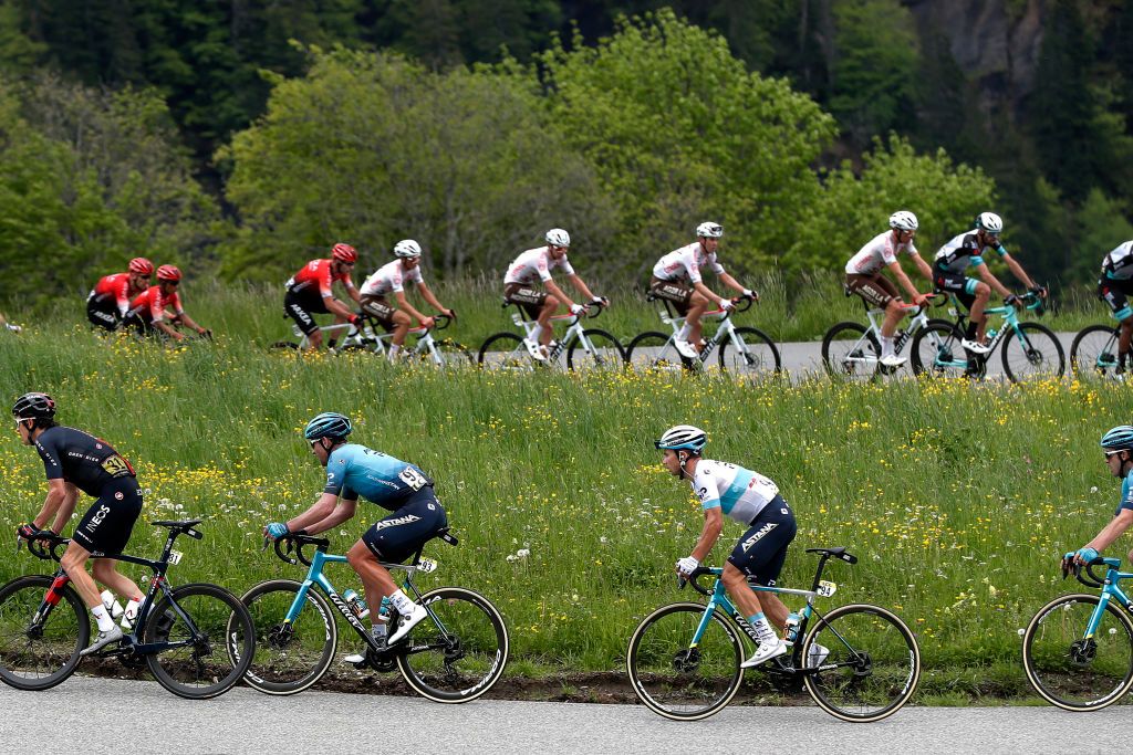 LES GETS FRANCE JUNE 06 Dmitriy Gruzdev of Kazahkstan Alexey Lutsenko of Kazahkstan and Team Astana Premier Tech during the 73rd Critrium du Dauphin 2021 Stage 8 a 147km stage from La LchreLesBains to Les Gets 1160m UCIworldtour Dauphin dauphine on June 06 2021 in Les Gets France Photo by Bas CzerwinskiGetty Images