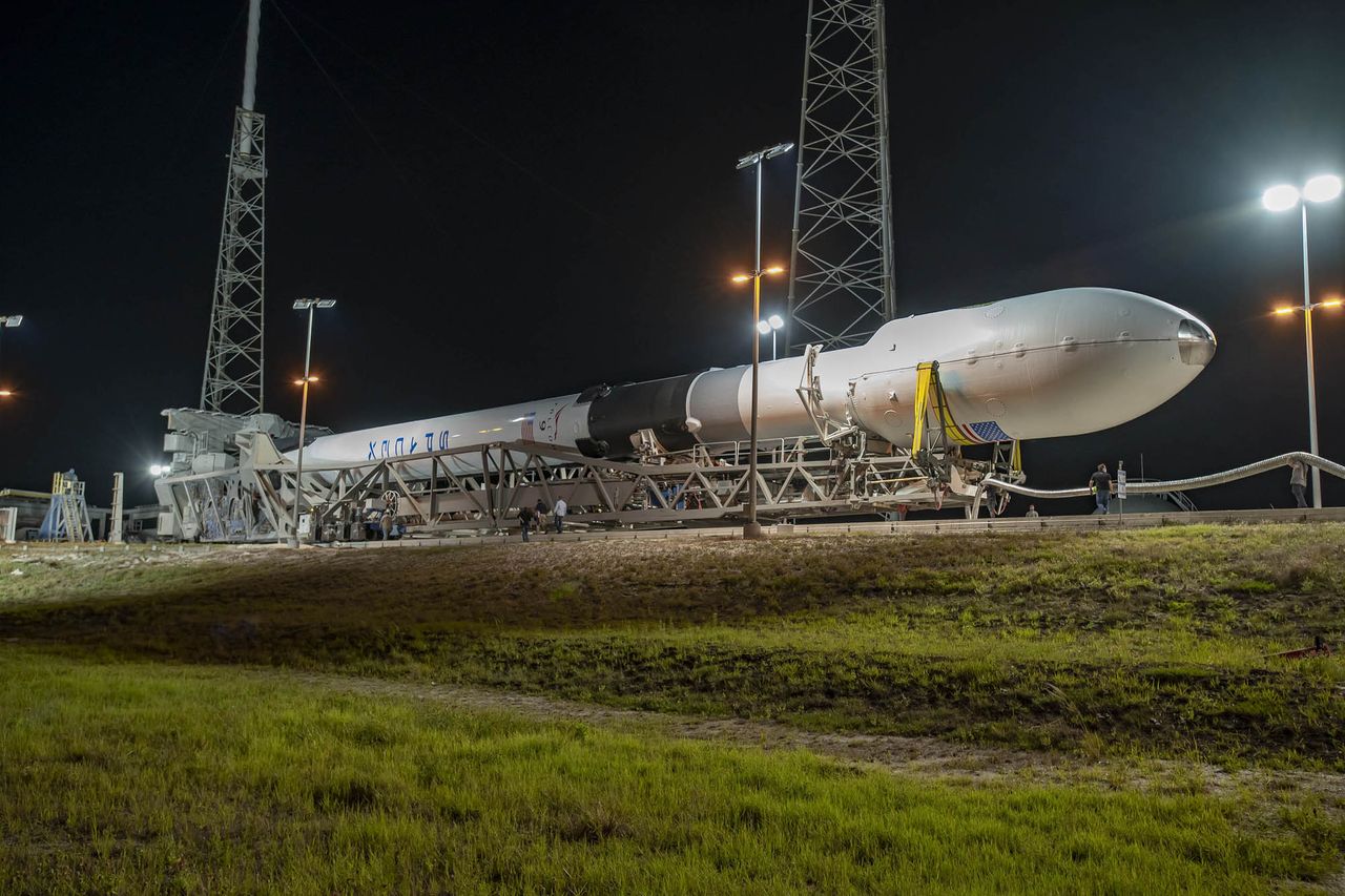 The SpaceX Falcon 9 rocket carrying the GPS III SV03 satellite rolls to the launch pad at SLC-40 of Cape Canaveral Air Force Station, Florida.