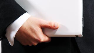 Manager holding a binder
