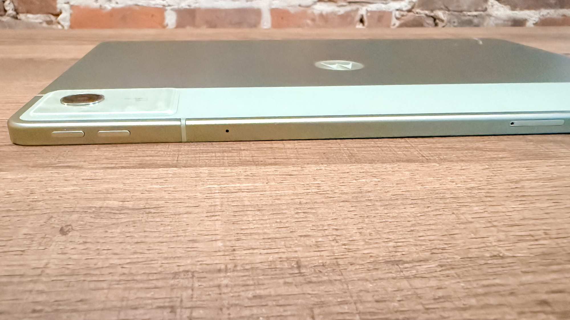A side view of the Motorola MotoPad (2026) showing off its microSD card reader