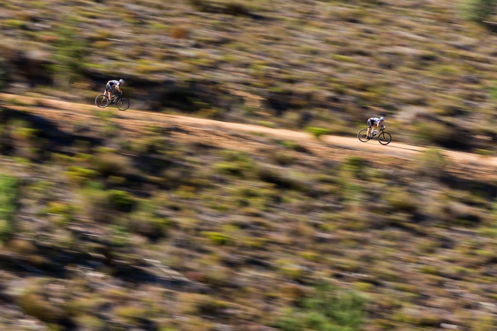 Christoph Sauser and Jaroslav Kulhavy (Investec-Songo-Specialized) speed downhill