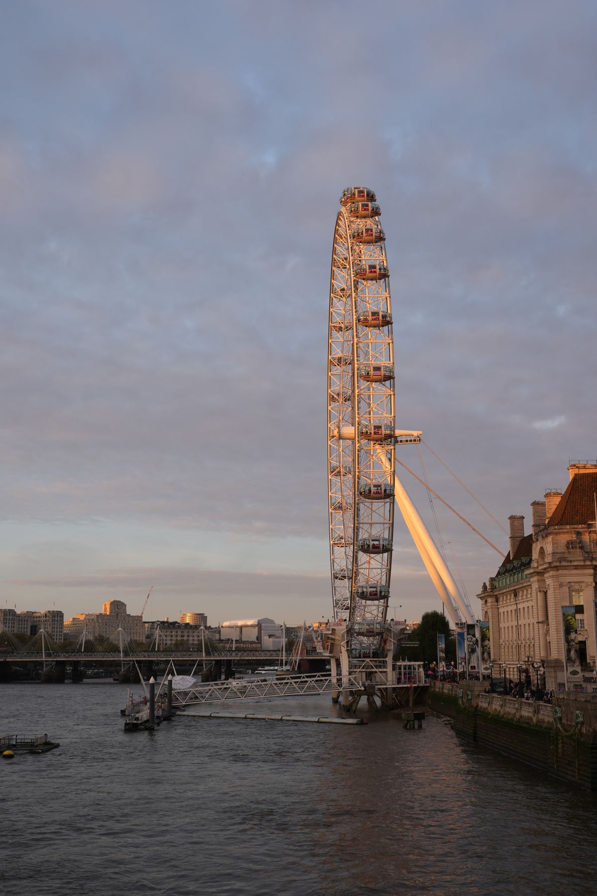 The London Eye and the River Thames at sunset seen from Westminster Bridge