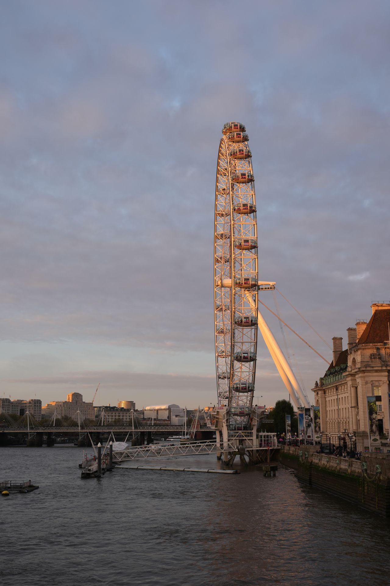 The London Eye and the River Thames at sunset seen from Westminster Bridge