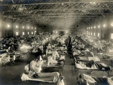 Beds with patients in an emergency hospital in Camp Funston, Kansas, in the midst of the Spanish flu pandemic.