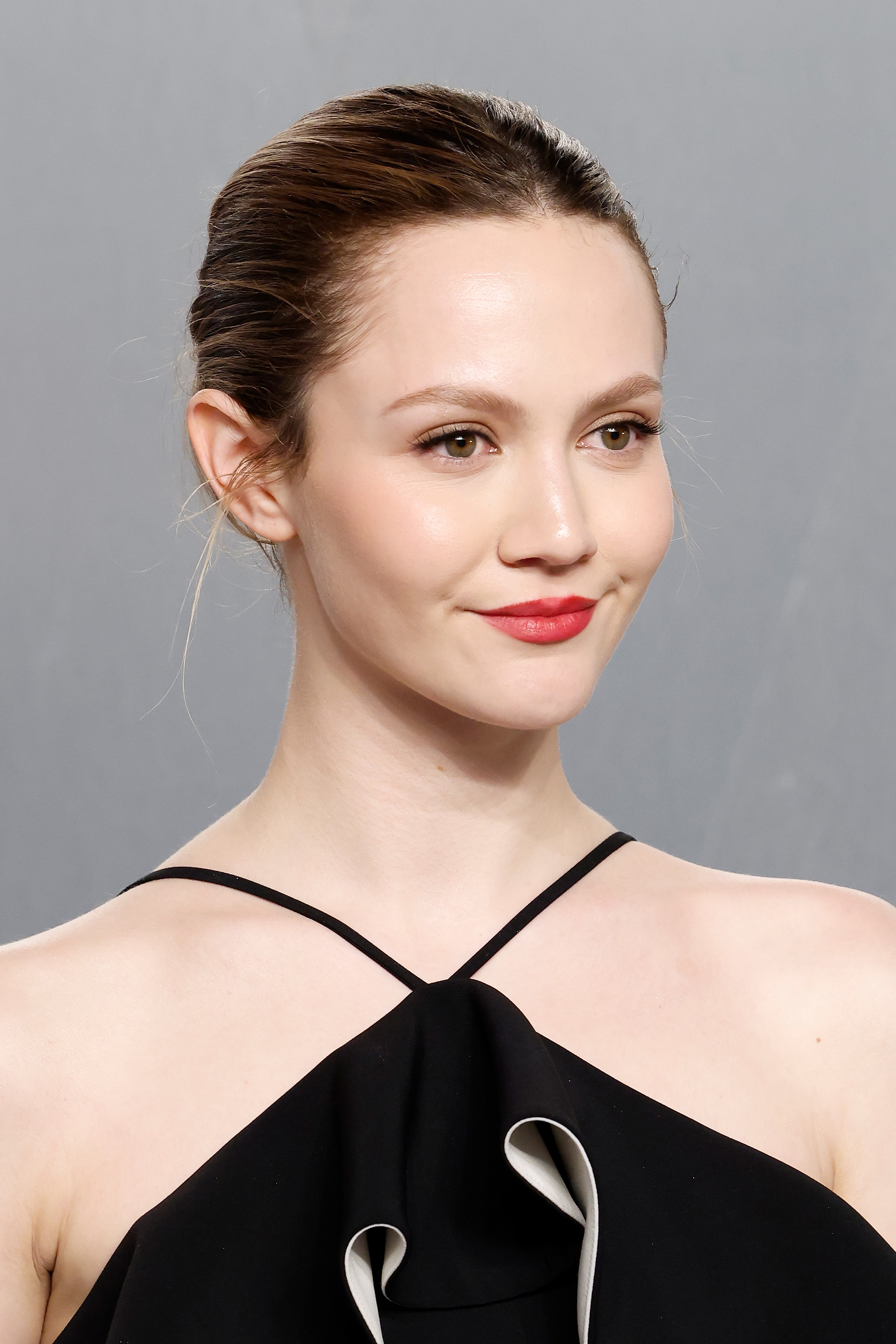 Photo of Iris Apatow with strawberry glaze lips