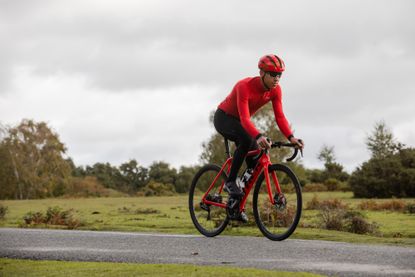 Image shows a rider who is wearing the best cycling clothing brands