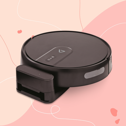 Aldi robot vacuum on pink background