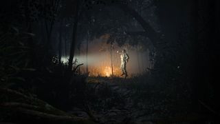 Soldier lit up in dark wood
