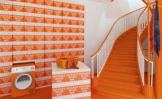 The pop-up is imagined in the maison’s signature orange