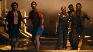 L to R: Xavier Dobbs (David Iacono), Reuben Delgado (Manuel Garcia-Rulfo), Zora Bennett (Scarlett Johansson), Duncan Kincaid (Mahershala Ali) and Dr. Henry Loomis (Jonathan Bailey) in JURASSIC WORLD REBIRTH, directed by Gareth Edwards.