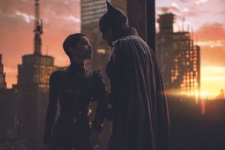 Virtual cinematography; catwoman and batman on a roof at sunset