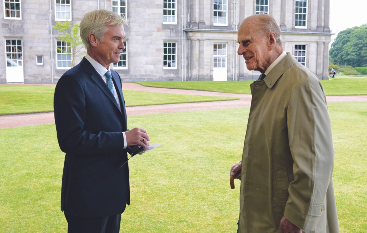 Quite a change of gear for Phillip Schofield who abandons the This Morning sofa to talk to HRH Prince Philip as the Duke of Edinburgh’s Award (DofE) celebrates its 60th anniversary.